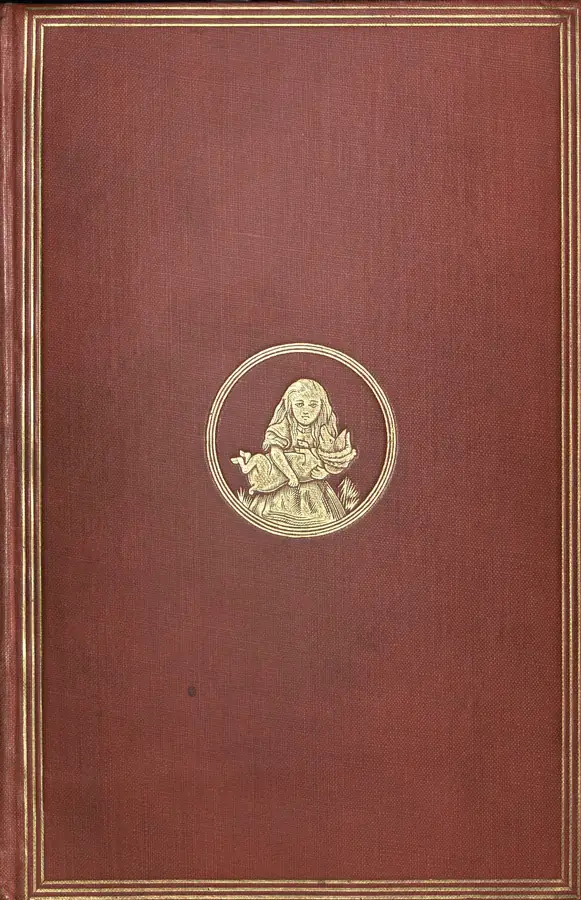 Red gilt pictorial cloth cover, 1865 edition of Alice's Adventures in Wonderland by Lewis Carroll, Macmillan and Co., London, 1865